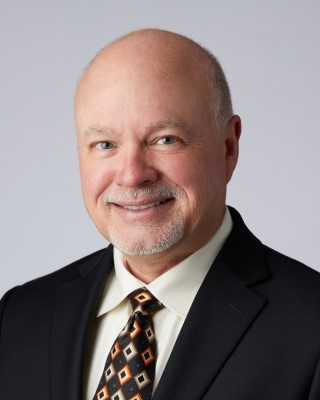 French Bolen of Enterprise Signs earns ProFM Credential